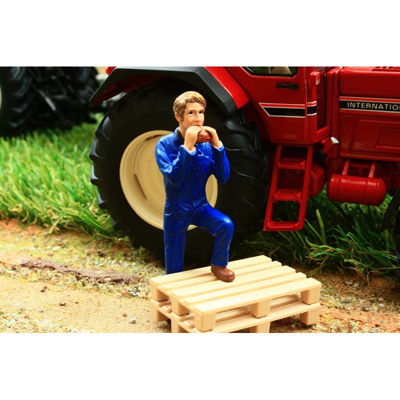 AT32120 AT Collections Farmer Standing Eating Sandwich