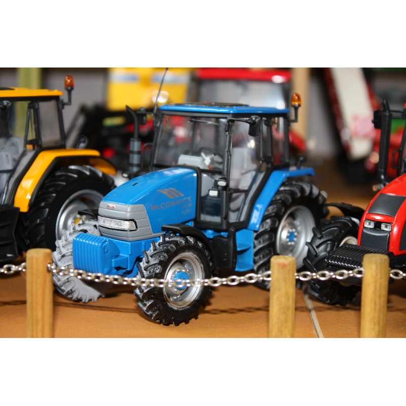UH2391 McCormick CX105 Tractor in Blue by Farm Models