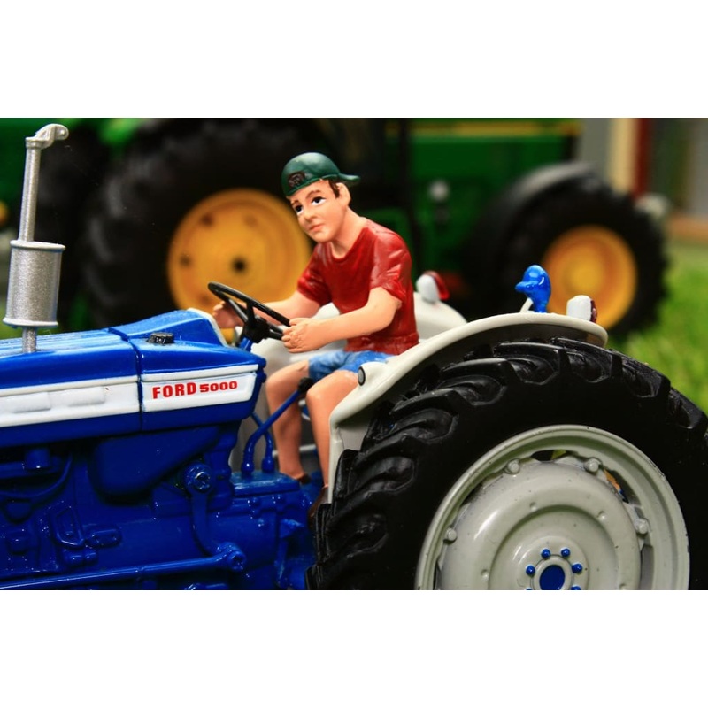 AT32141 AT Collections Jeff The Teenager Figure Driving Tractor
