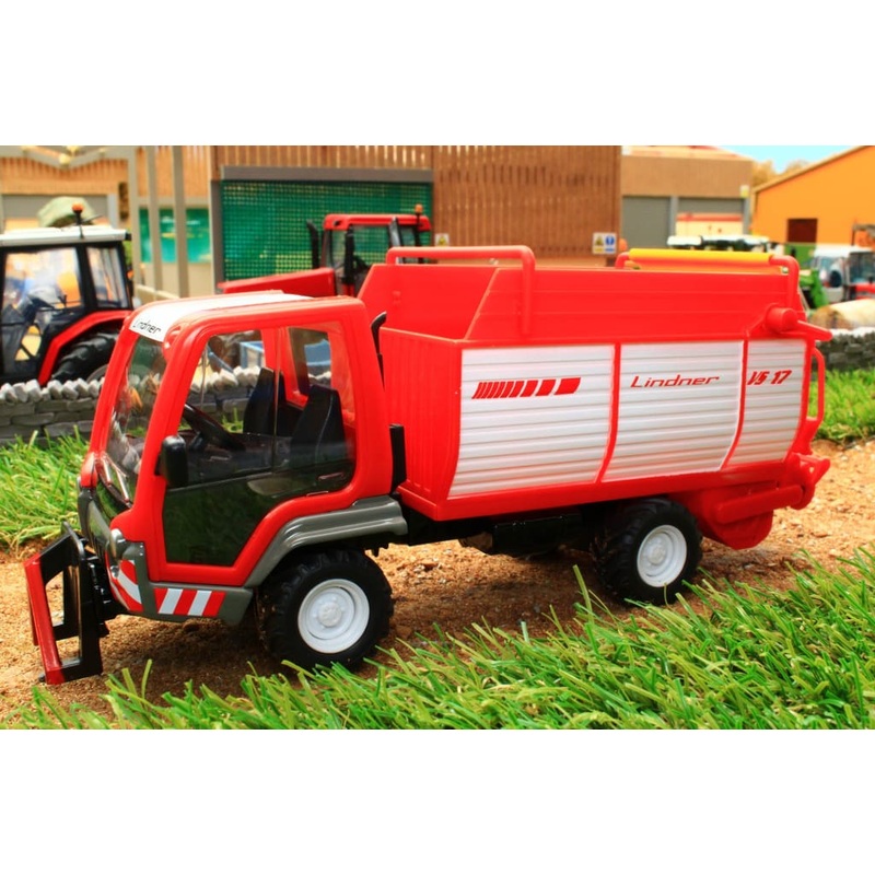 3061 SIKU LINDNER UNITRAC WITH FORAGE TRAILER
