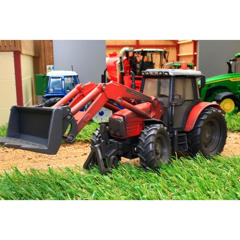 3653(w) WEATHERED SIKU MASSEY FERGUSON TRACTOR WITH FRONT LOADER